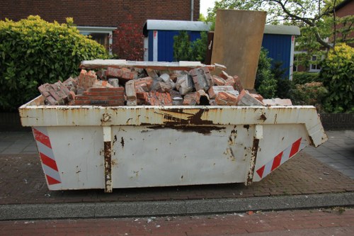 Waste removal truck in Tadworth community setting