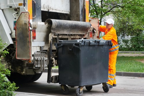 Collection vehicle loading separated recycling bins